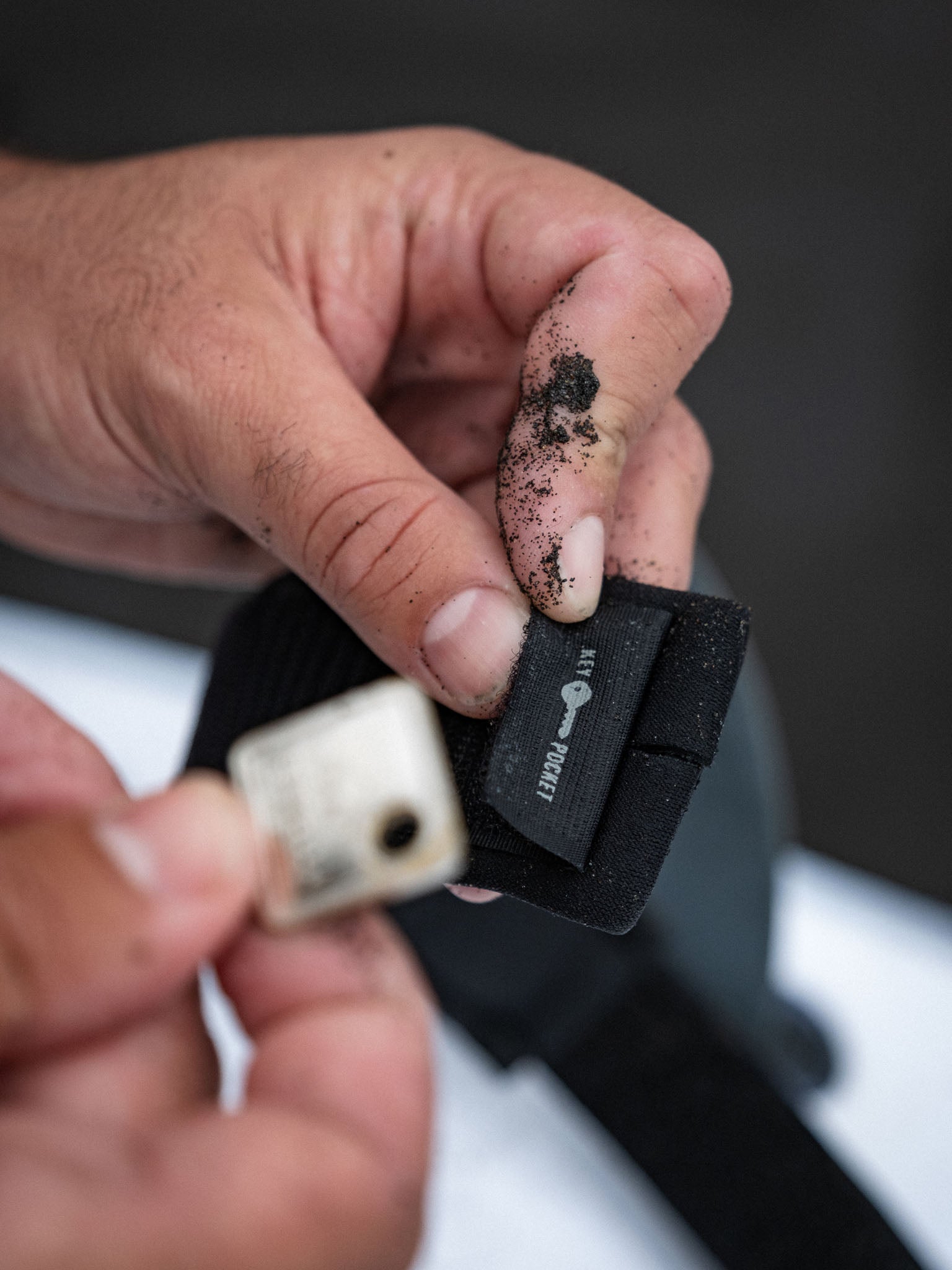 “Detailed image of cuff stitching, velcro, and leash swivel mechanism”
