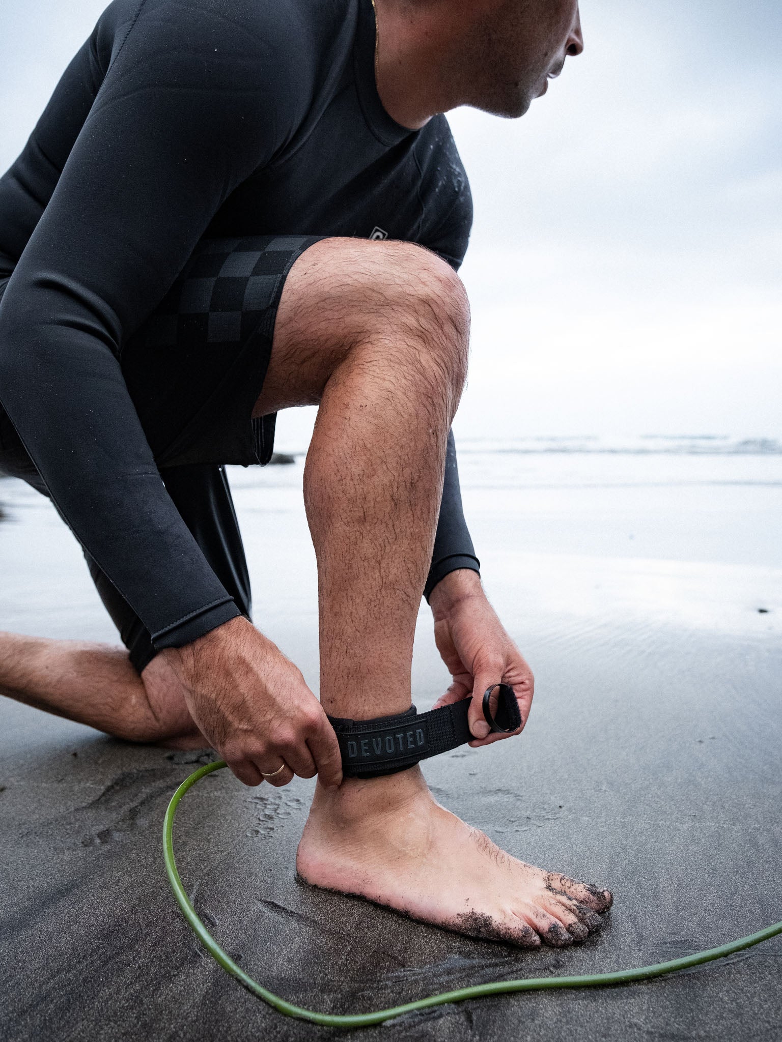 “Core Series leash in gritty beach environment for real-world use”
