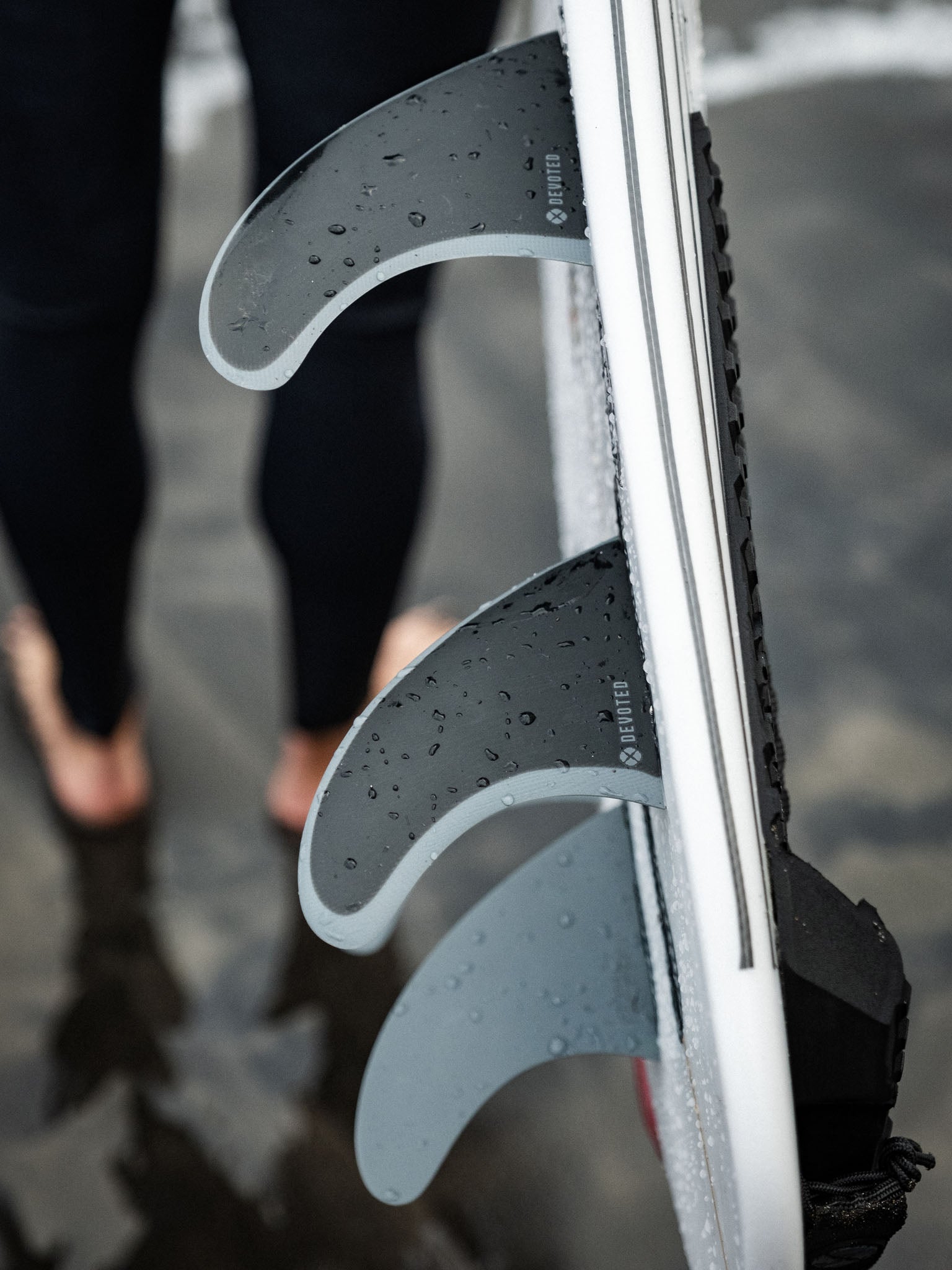 Devoted CSF Quad fin set in use on board outdoors, demonstrating quad setup for speed and control”