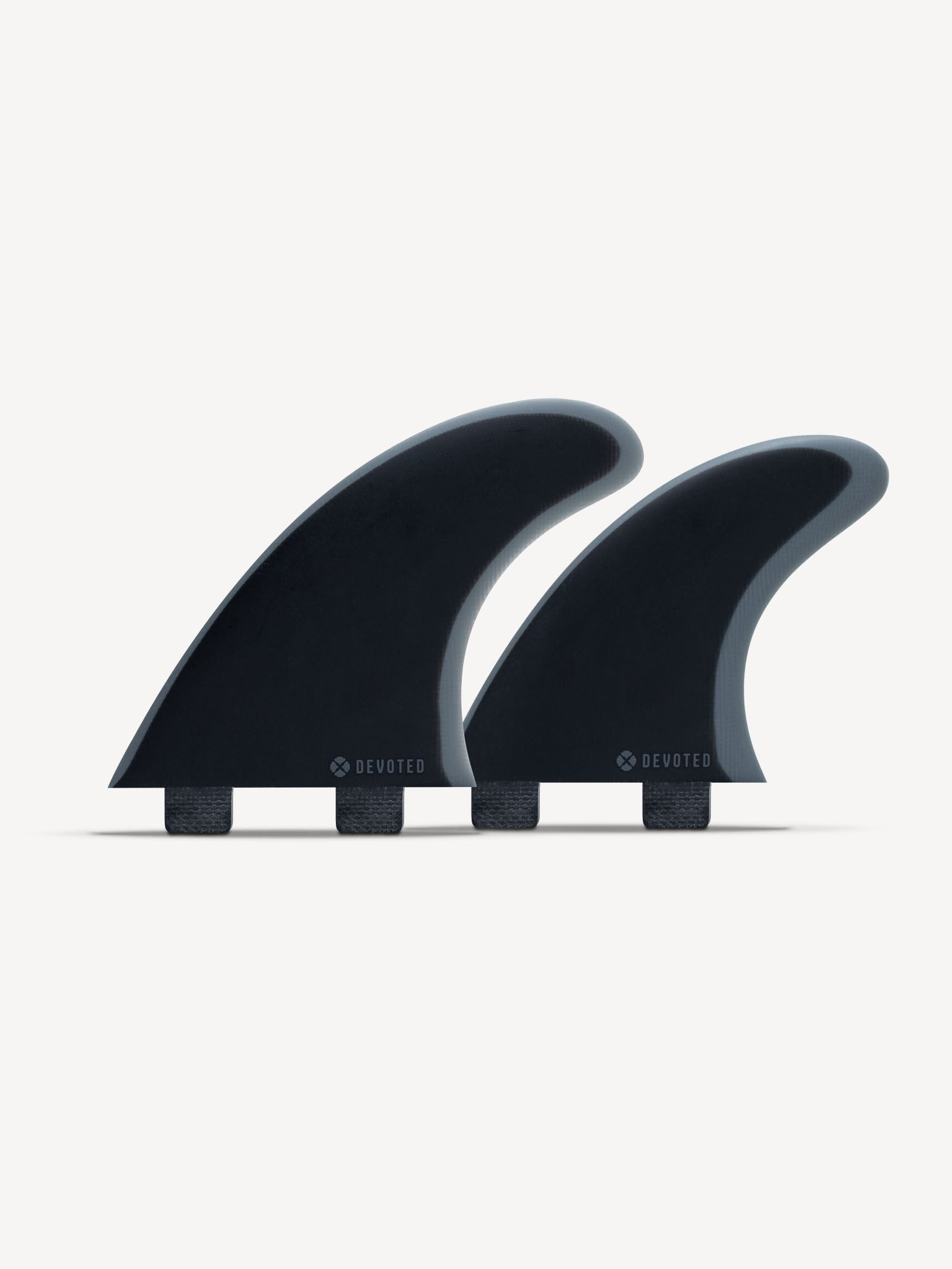 Devoted CSF Quad fibreglass fin set dual-tab in product layout, showing four-fin configuration”