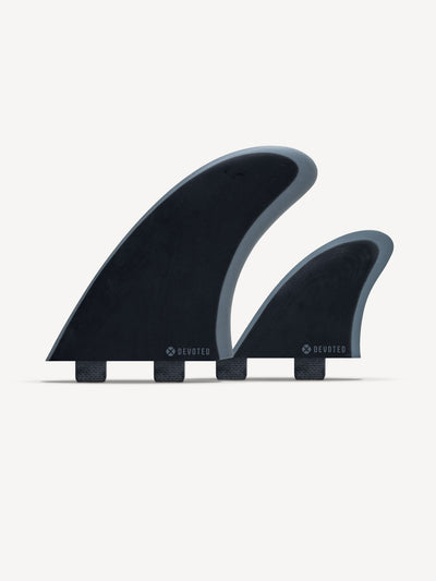 “Devoted CSF Twin+1 fibreglass fin set dual-tab shown in product view with two side fins and one center trailer fin”