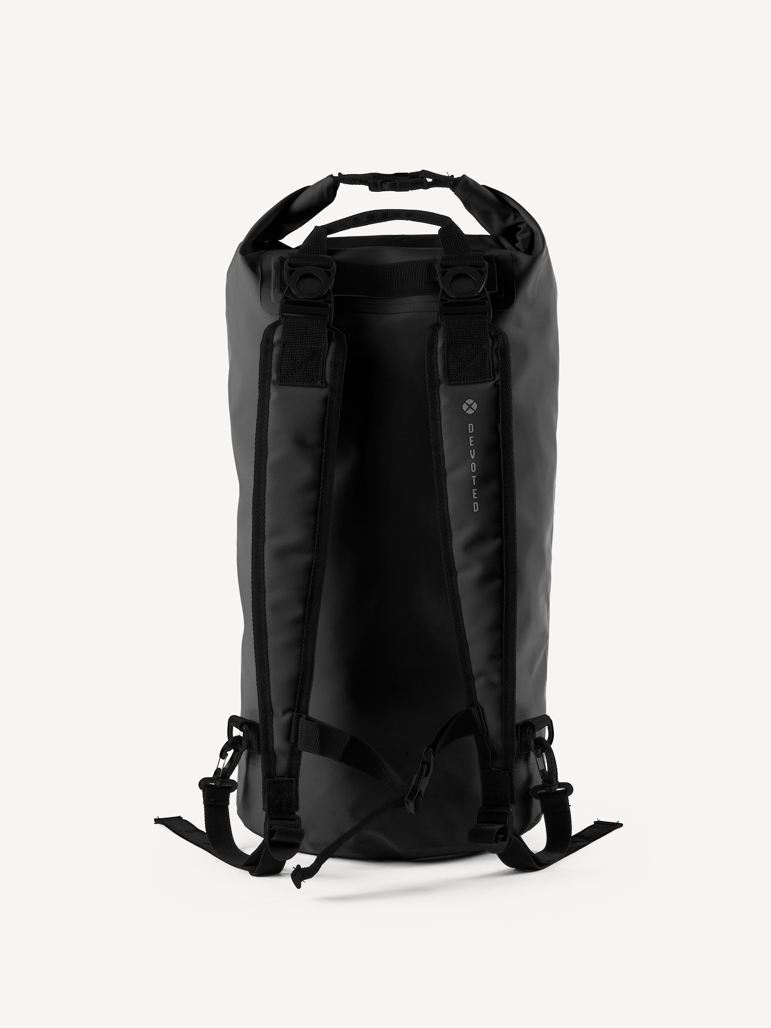 “Side angle of black waterproof dry bag with ergonomic straps”

