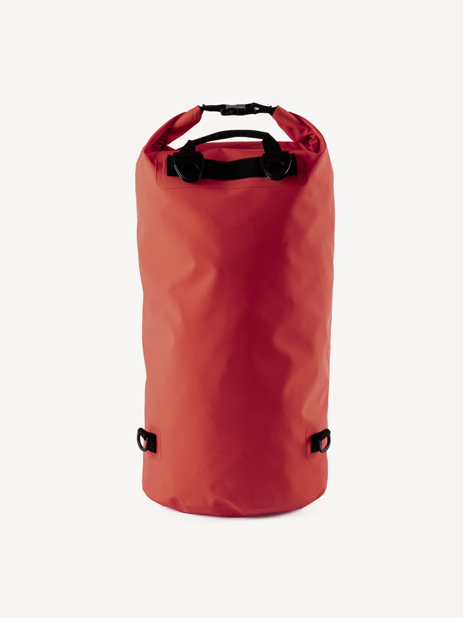 “Detailed image of Devoted logo and material texture on red dry bag”

