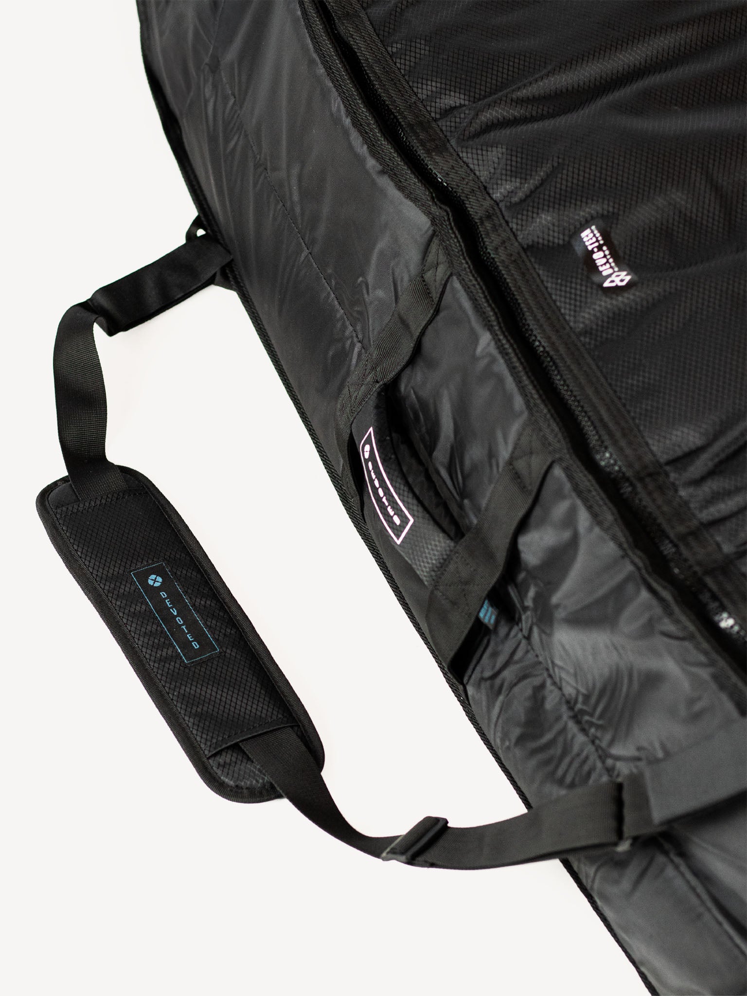 “Folded Fish 10mm Double Travel Boardbag for compact transport or storage”