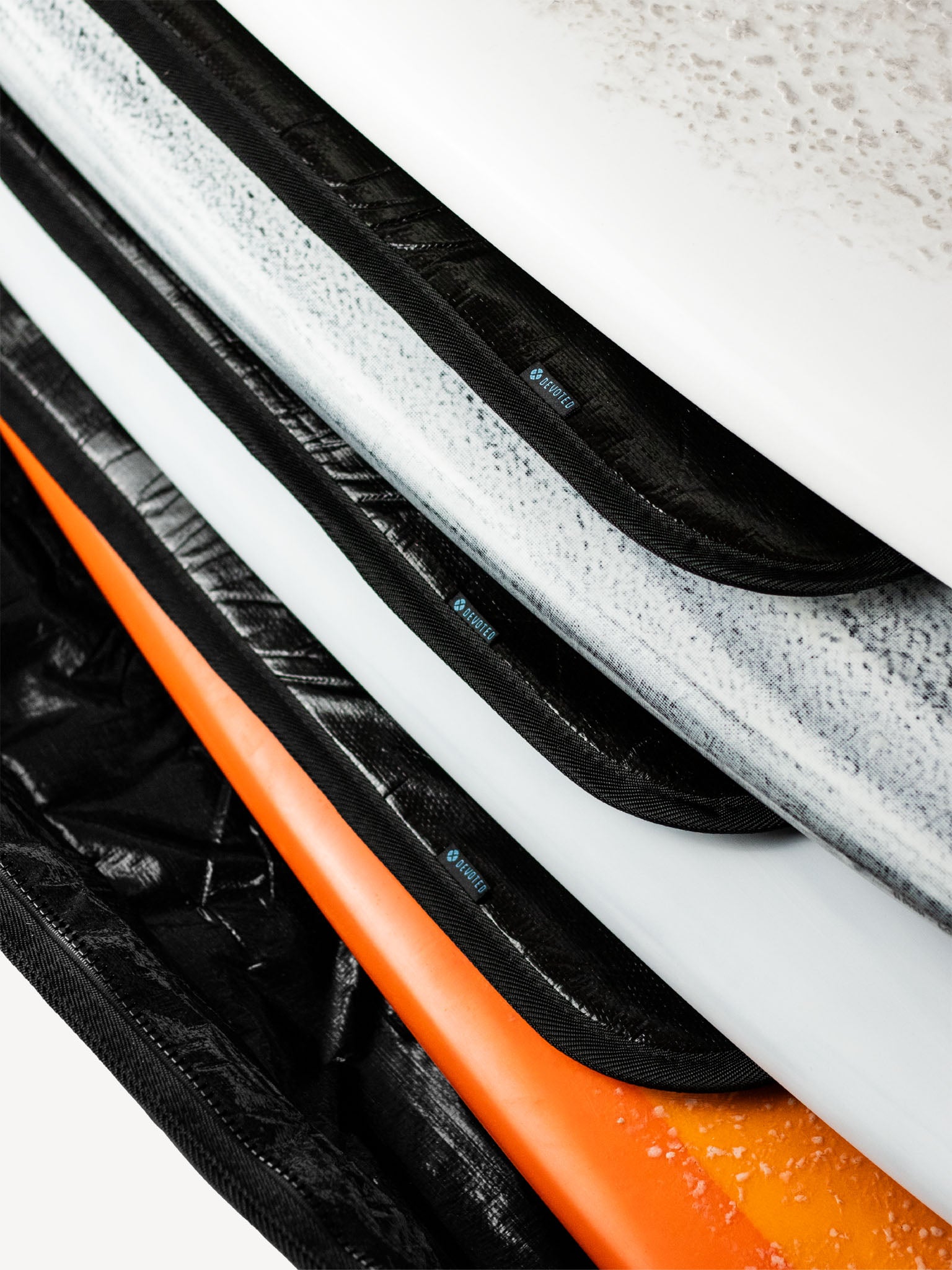 “Tail detail of Fish Quad Travel Boardbag showing padding and stitching”
