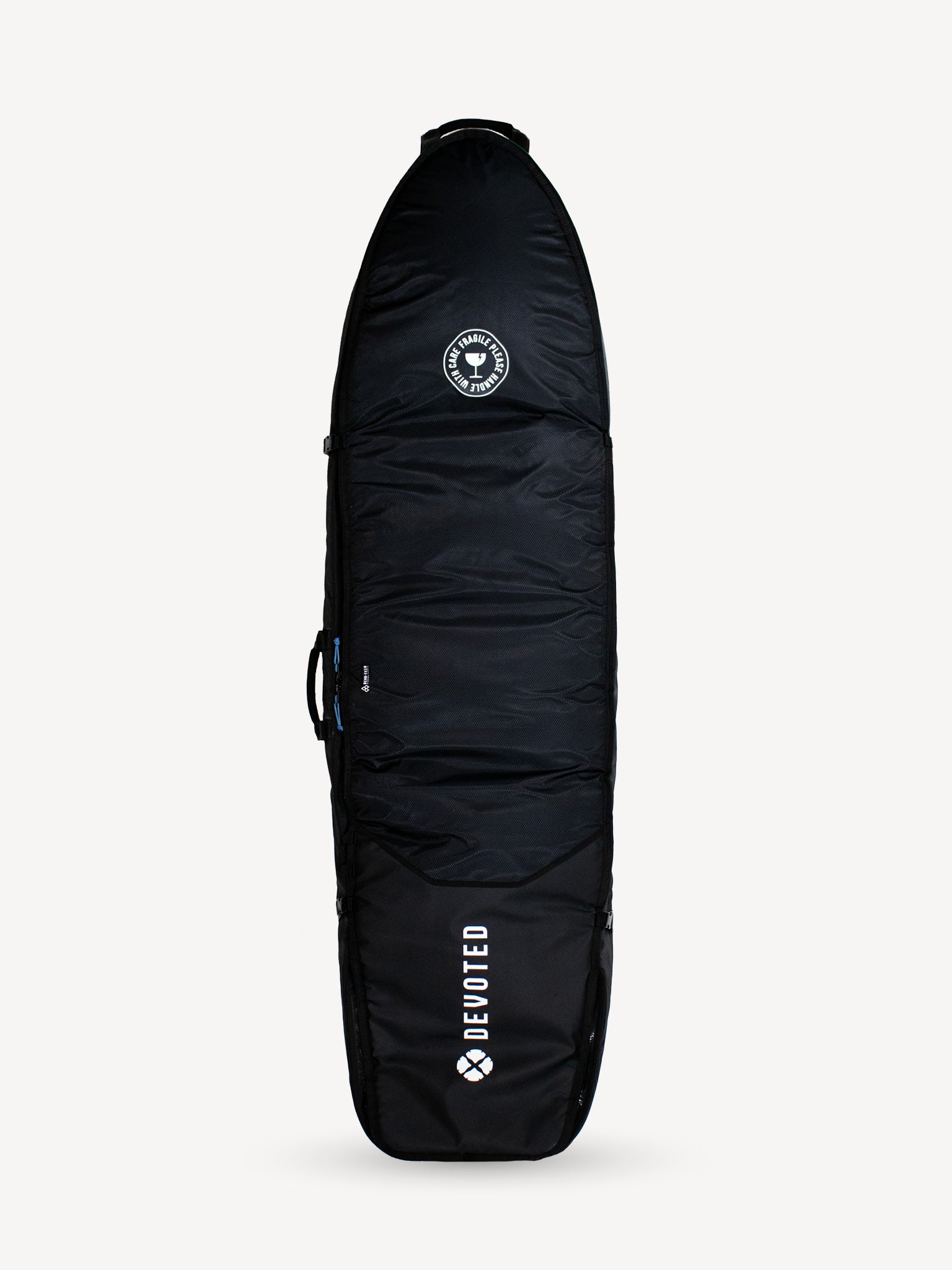 “Angled shot of Devoted Fish 10mm boardbag showing quad-fin capacity and reinforced nose”