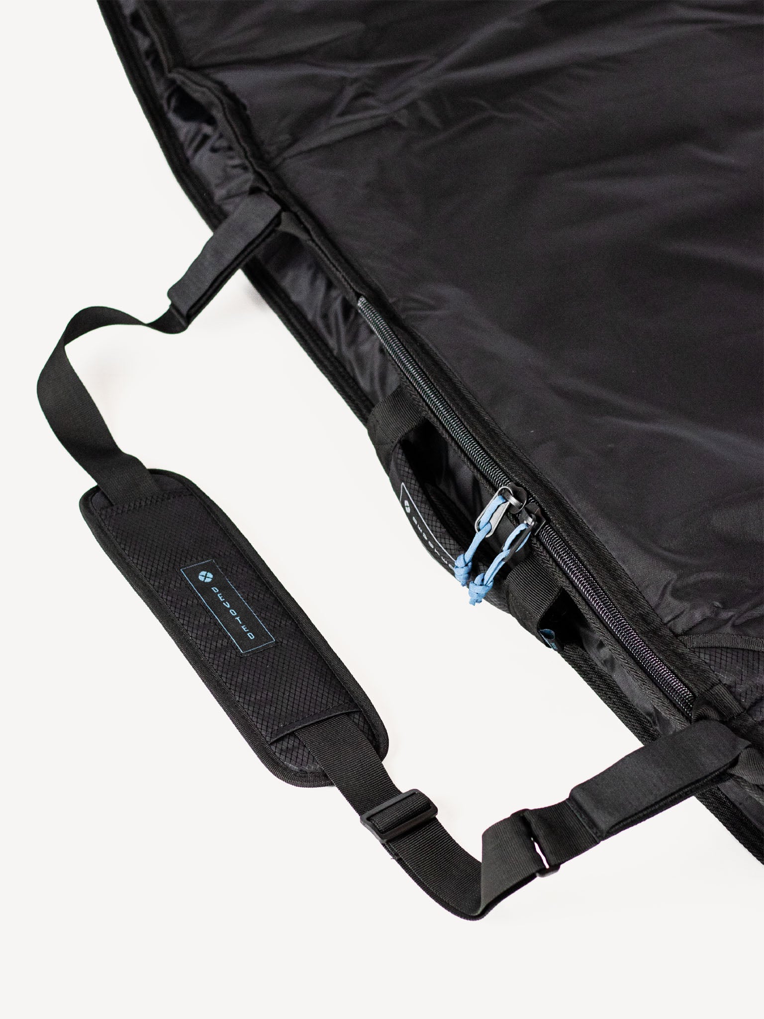 “Close-up of tail padding and strong stitching on Fish day boardbag”
