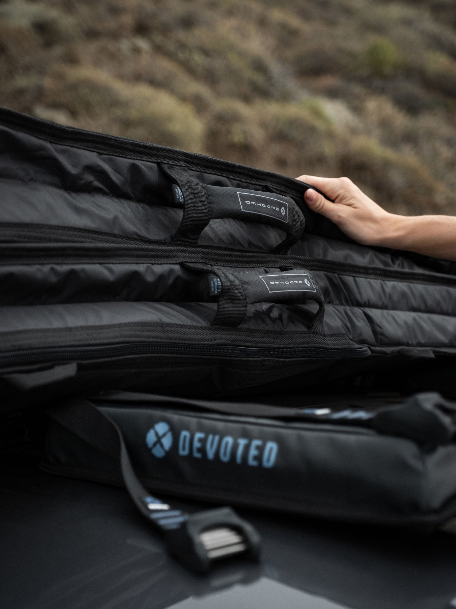 “Slim profile of the Fish 8mm Day Bag laid flat, showing its portability”
