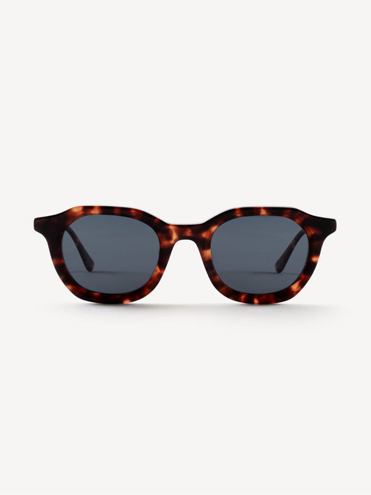 “Front view of Devoted RTBL polarized sunglasses in brown leopard with bold rectangular frame”