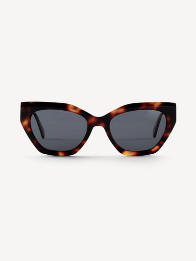 “Front view of Devoted Sanny polarized sunglasses in brown leopard with sleek rounded frame”